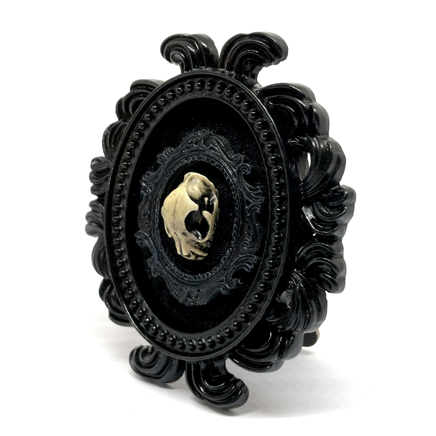 Small Black Resin Oval Frame with Small Resin Cat Skull on Black Velvet Gothic Home Deco