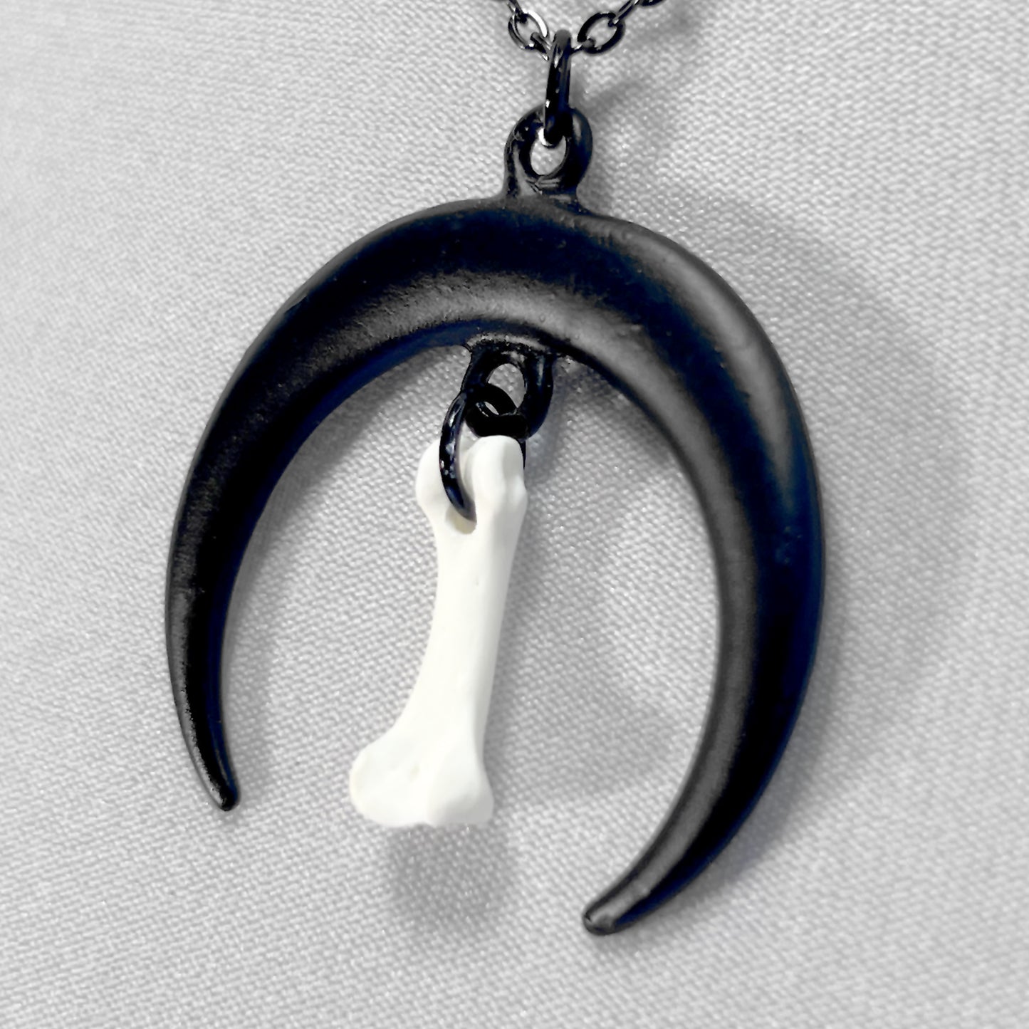 Large Black Crescent Moon and Tiny Bone Necklace