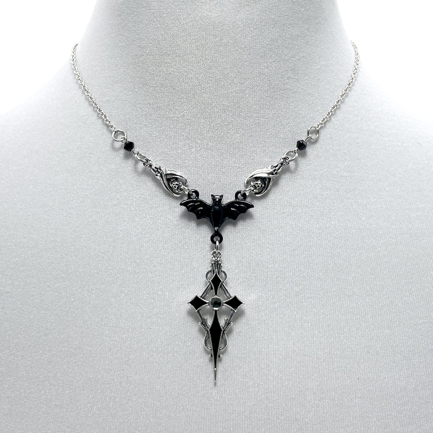 Silver and Black Three Bat Necklace with a Pointed Gothic Cross