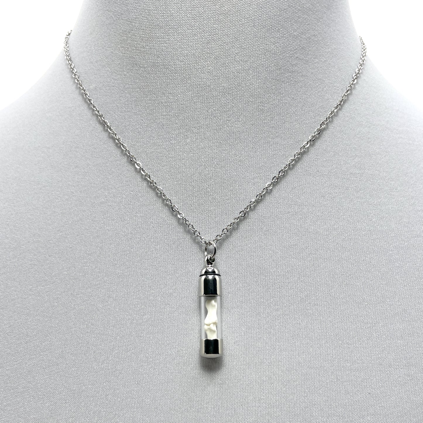 Tiny Silver Glass Vial Filled with Little Bones