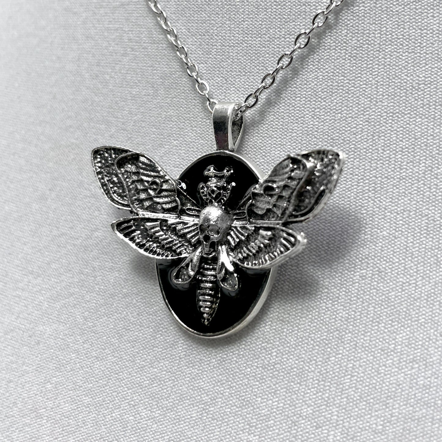 Small Flying Death Head on Black Necklace