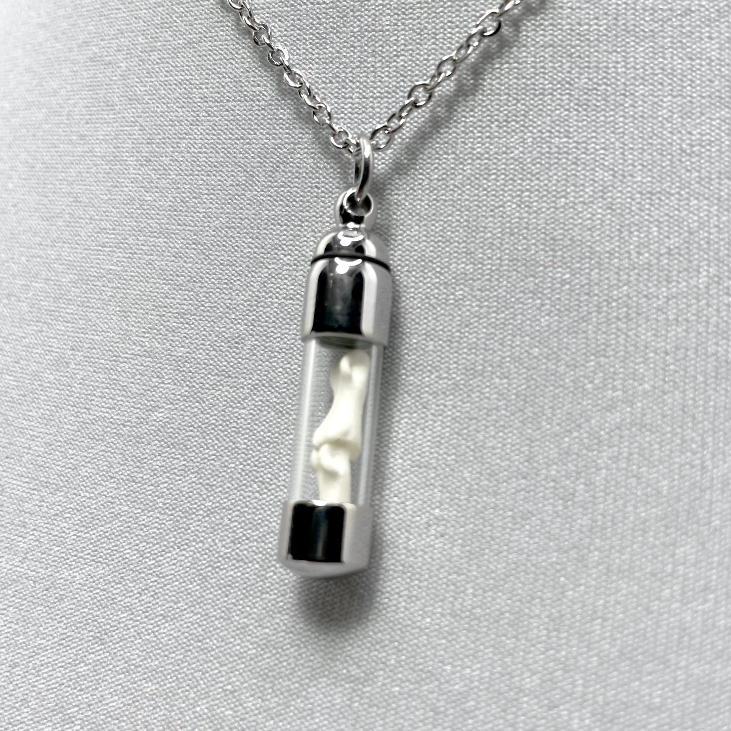 Tiny Silver Glass Vial Filled with Little Bones