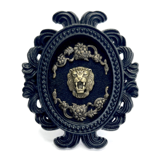 Small Black Resin Oval Frame with Brass Lion Face on Black Velvet Gothic Home Deco