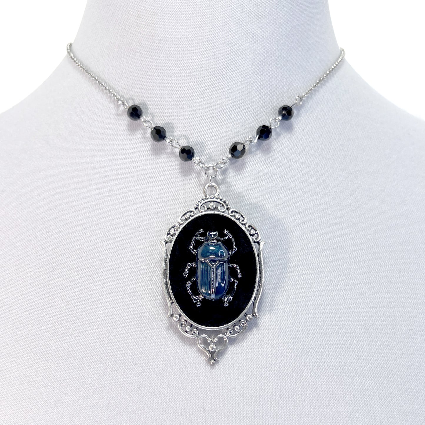 Blue and Silver Beetle on Beeded Chain