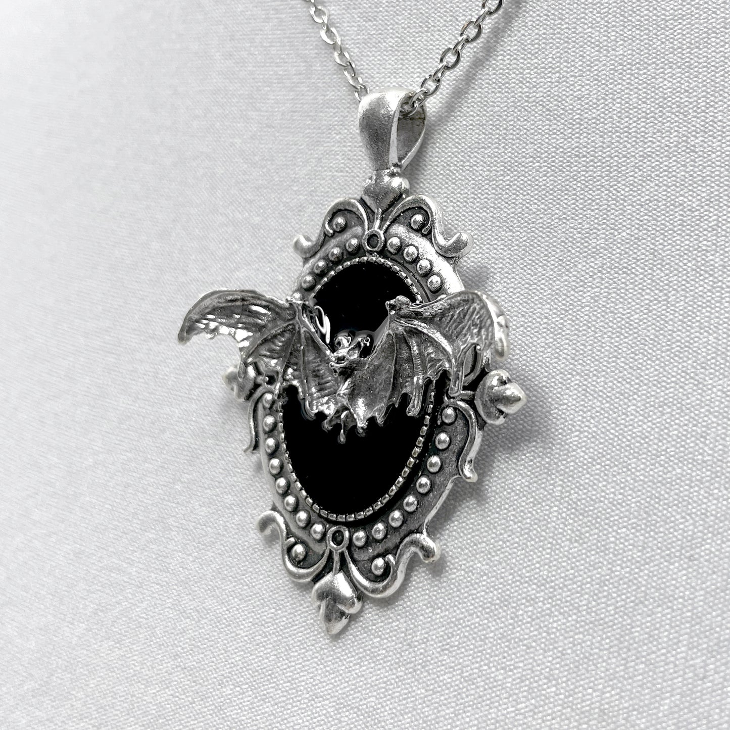 Silver Flying Bat on Black Victorian Pendant
