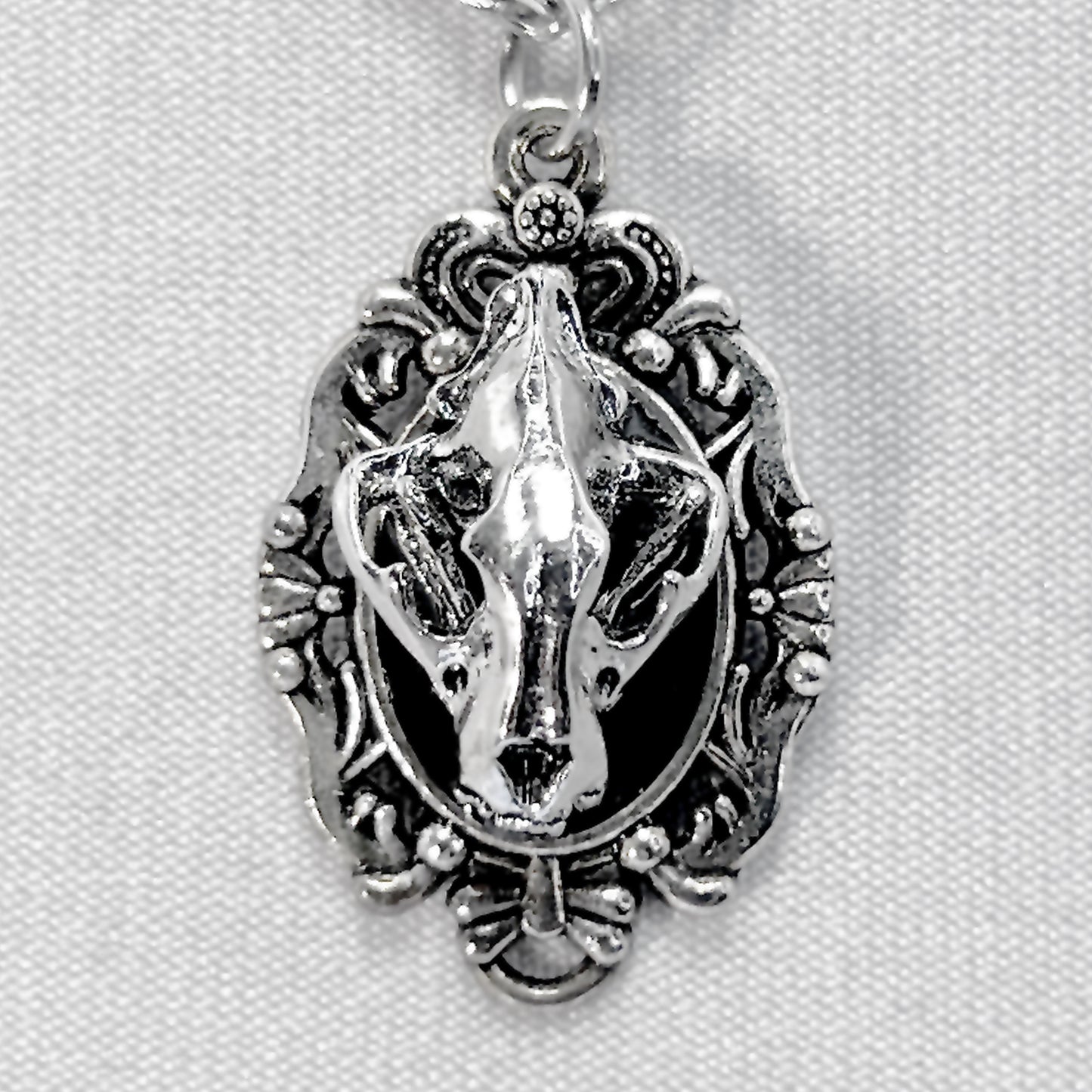 Tiny Metal Wolf Skull on Black Victorian Pendant