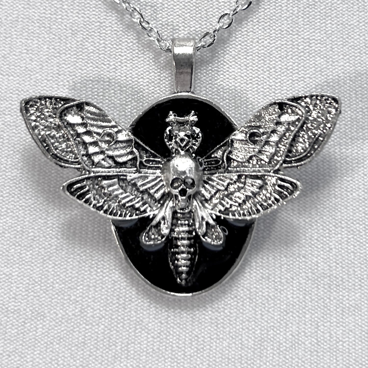 Small Flying Death Head on Black Necklace